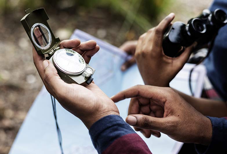 Person holding compass image